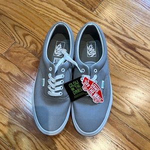 Size 11 Glow in the Dark Vans. Never been worn, new with tags!